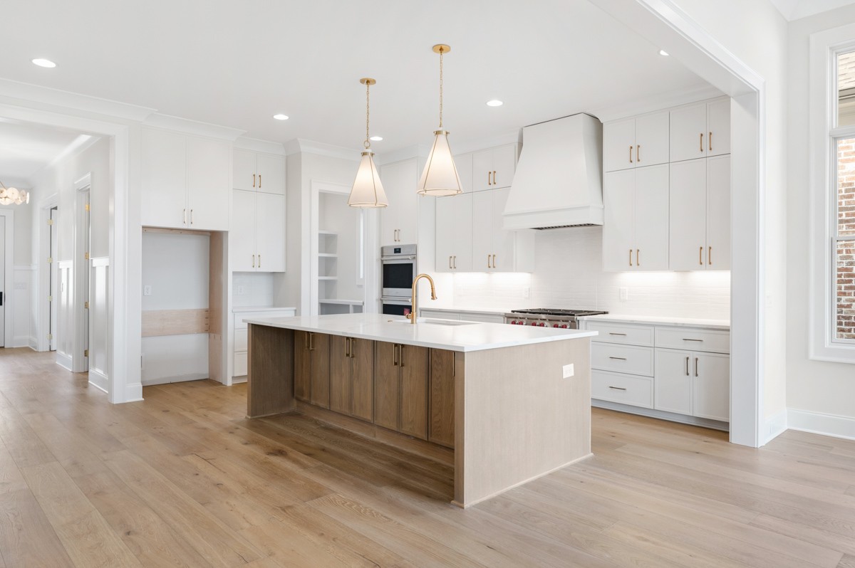 3151 Long Br Circle Franklin, TN 37064 - Photo 14 of 61 a kitchen with kitchen island a sink stainless steel appliances and cabinets
