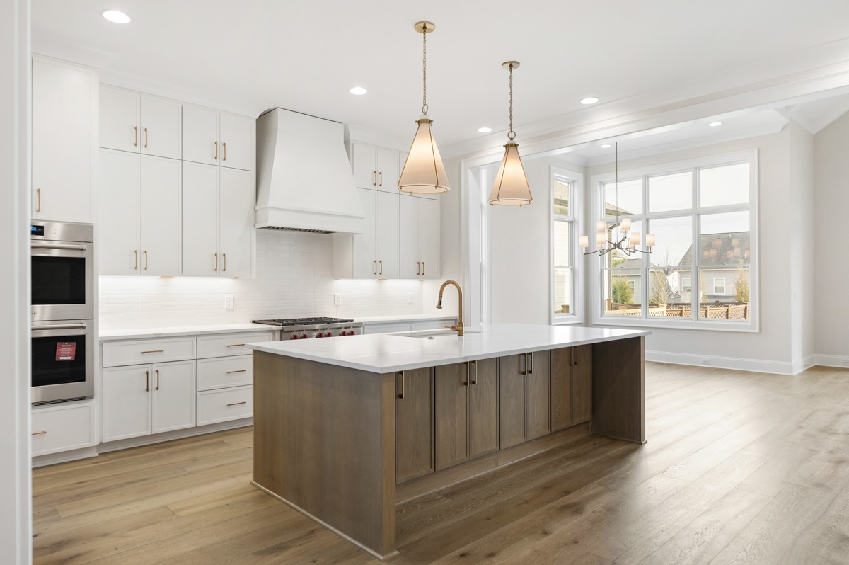 3151 Long Br Circle Franklin, TN 37064 - Photo 15 of 61 a kitchen with a sink stove and cabinets