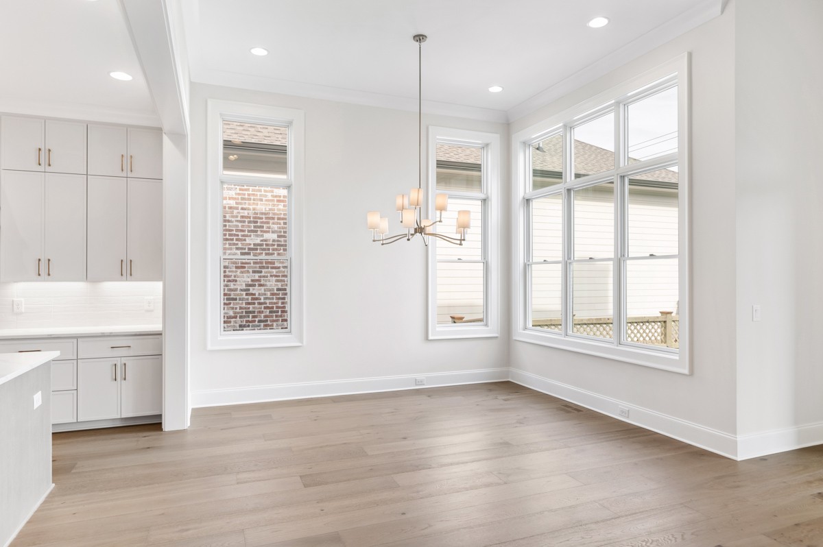 3151 Long Br Circle Franklin, TN 37064 - Photo 22 of 61 a view of an empty room with a window and wooden floor
