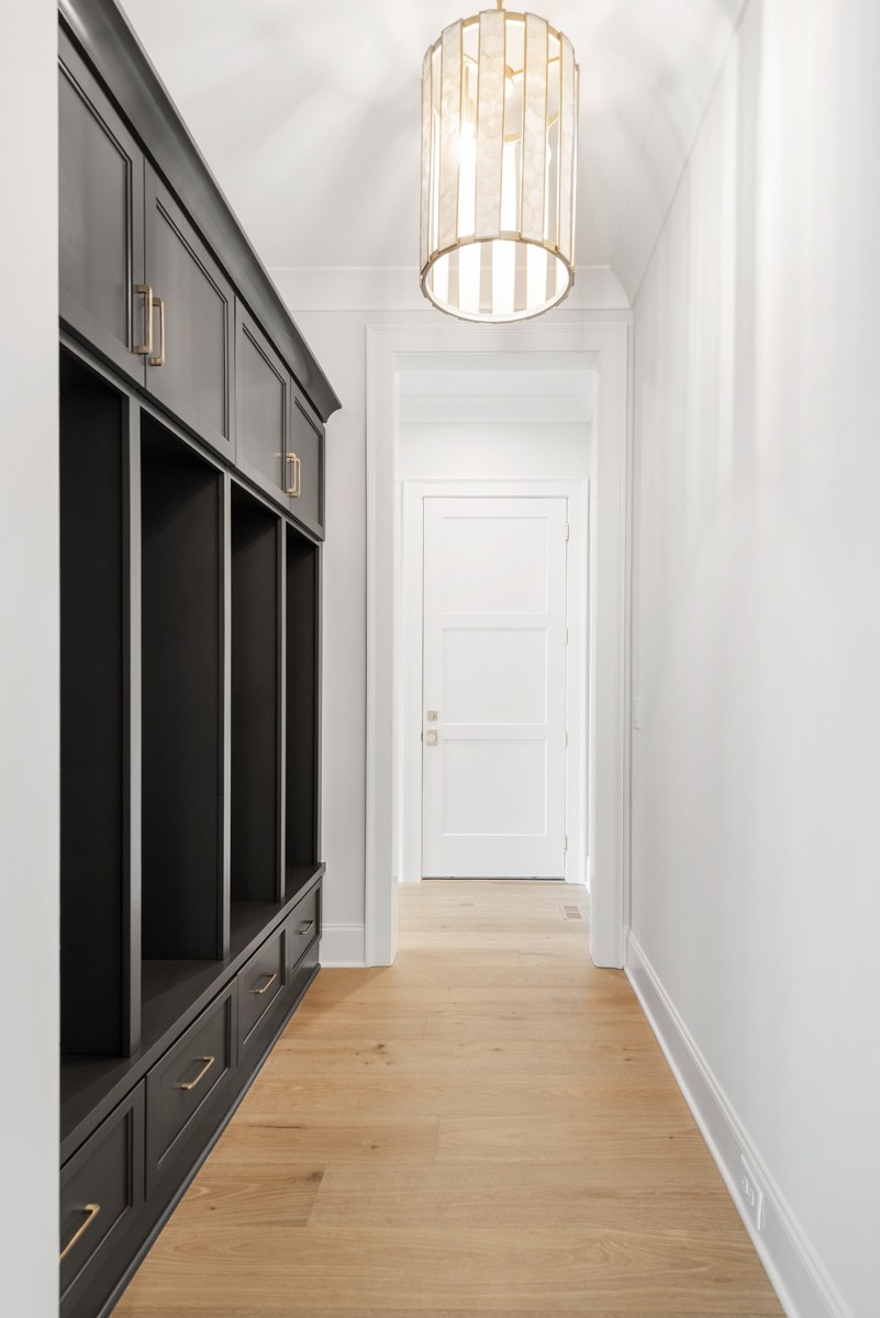 3151 Long Br Circle Franklin, TN 37064 - Photo 32 of 61 an empty room with wooden floor cabinet and mirror