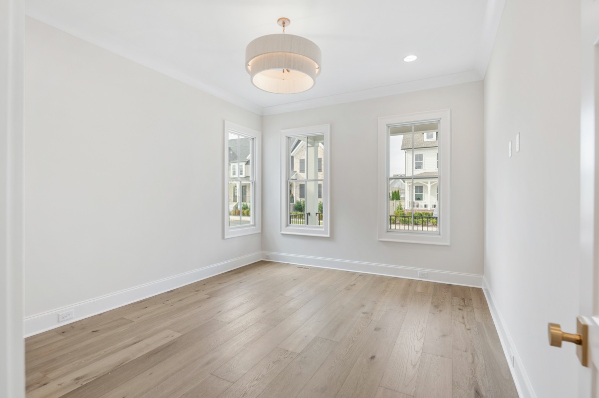 3151 Long Br Circle Franklin, TN 37064 - Photo 34 of 61 an empty room with wooden floor and windows