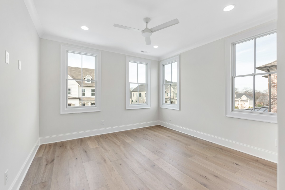 3151 Long Br Circle Franklin, TN 37064 - Photo 39 of 61 a view of an empty room with a window and wooden floor