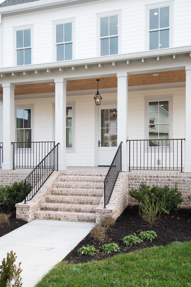 3151 Long Br Circle Franklin, TN 37064 - Photo 4 of 61 a front view of a house with a porch