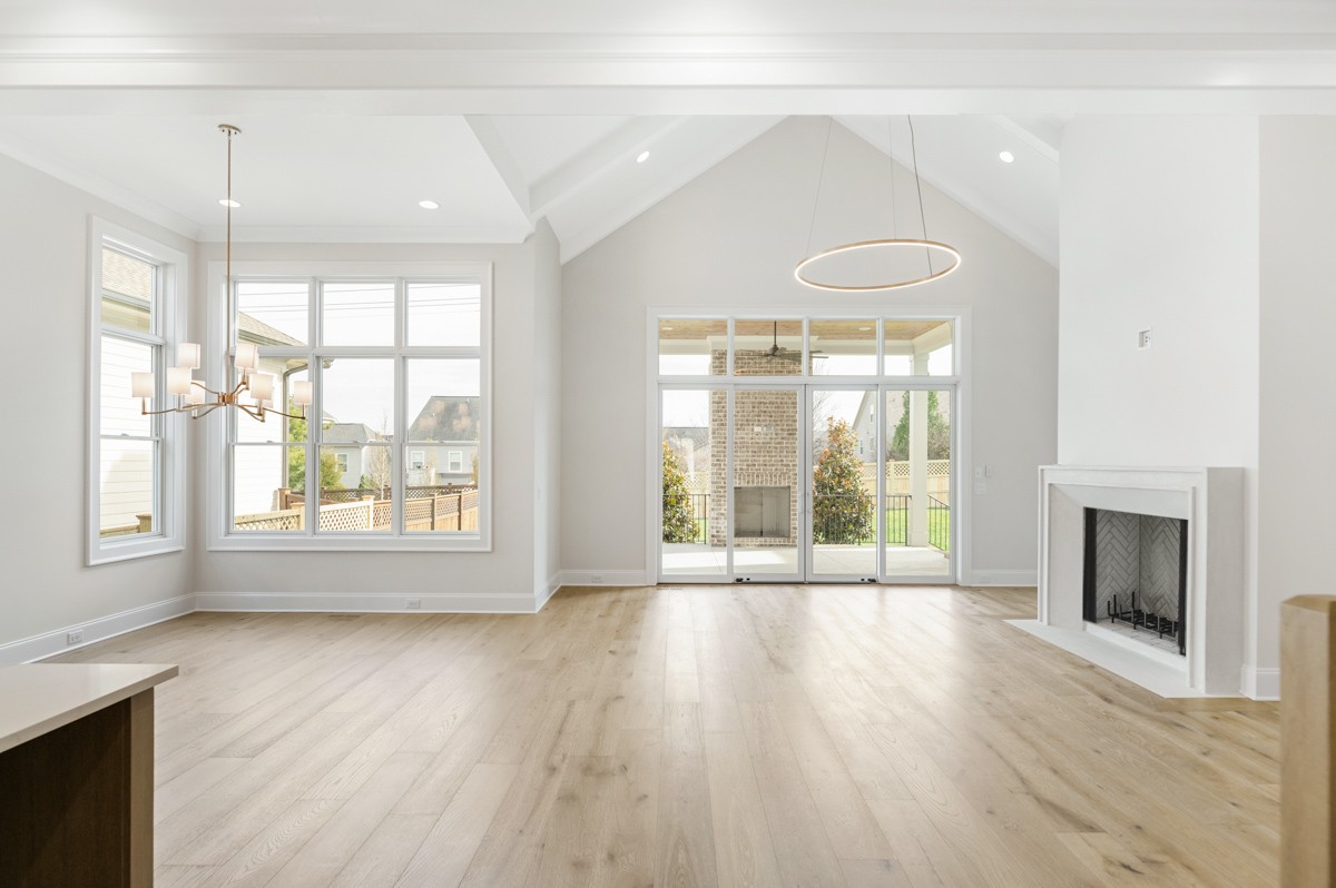 3151 Long Br Circle Franklin, TN 37064 - Photo 10 of 61 a view of an empty room with wooden floor and a window