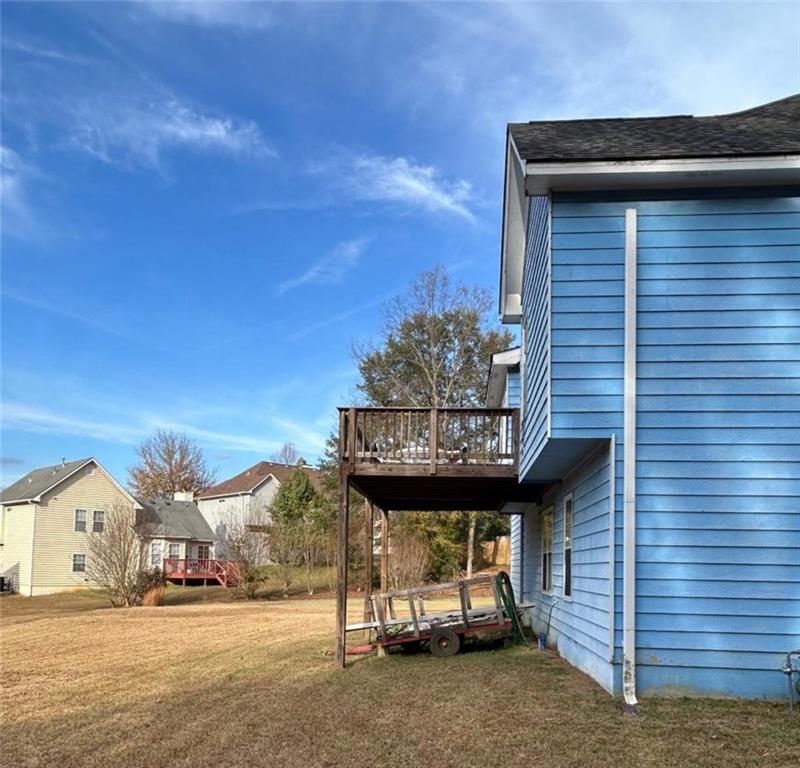 3658 Boulder Ridge Court Ellenwood, GA 30294 - Photo 2 of 4 a view of a car park in front of a house