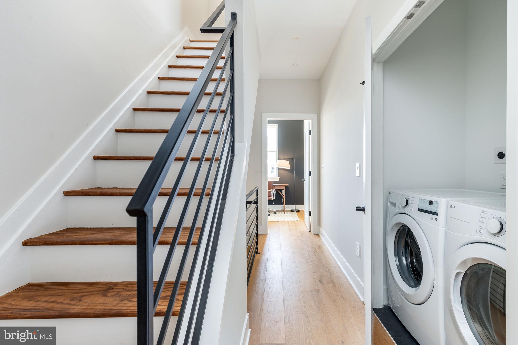 3841 Ridge Avenue Philadelphia, PA 19132 - Photo 20 of 45 a view of a hallway with washer and dryer