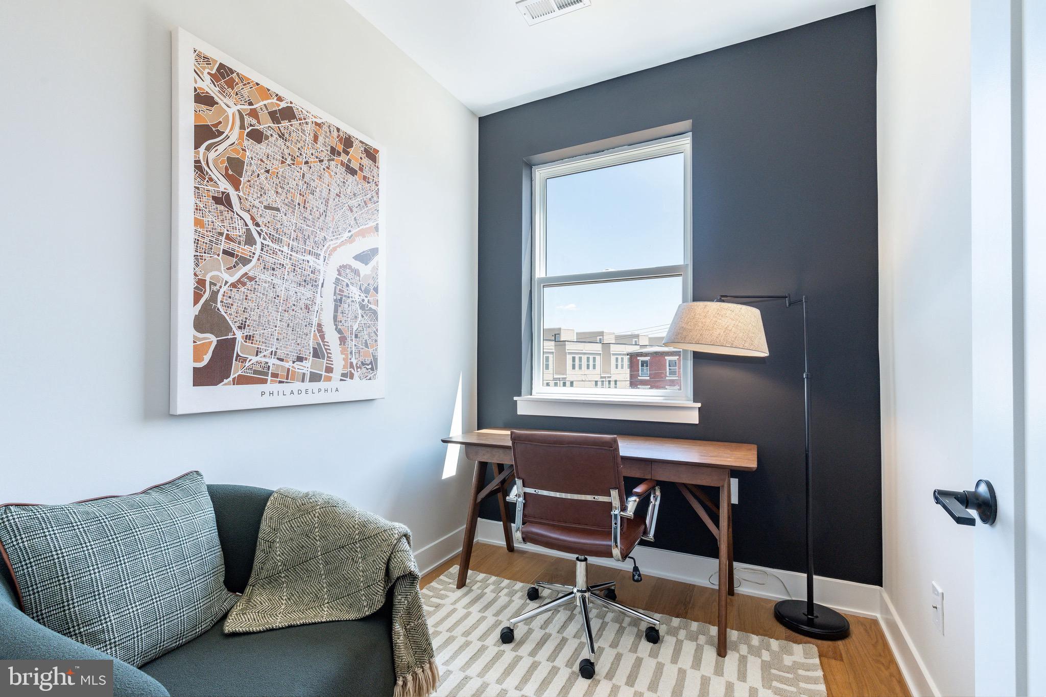 3841 Ridge Avenue Philadelphia, PA 19132 - Photo 22 of 45 a workspace with furniture and a window
