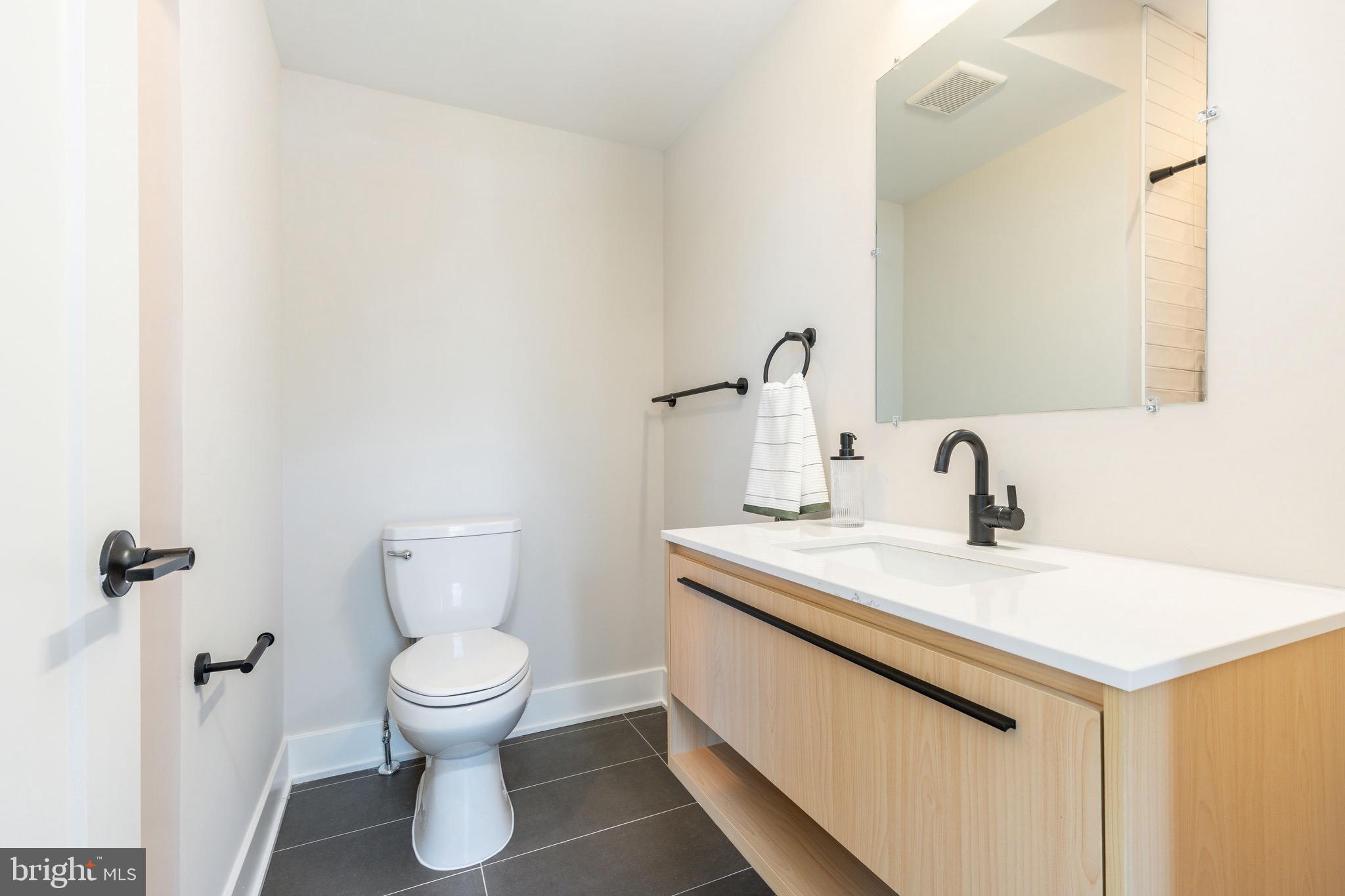 3841 Ridge Avenue Philadelphia, PA 19132 - Photo 27 of 45 a bathroom with a sink and a toilet