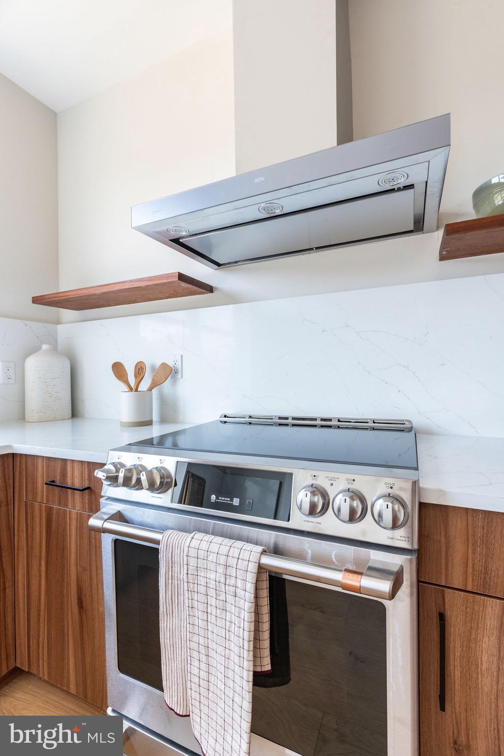 3841 Ridge Avenue Philadelphia, PA 19132 - Photo 4 of 45 a stove top oven sitting inside of a kitchen