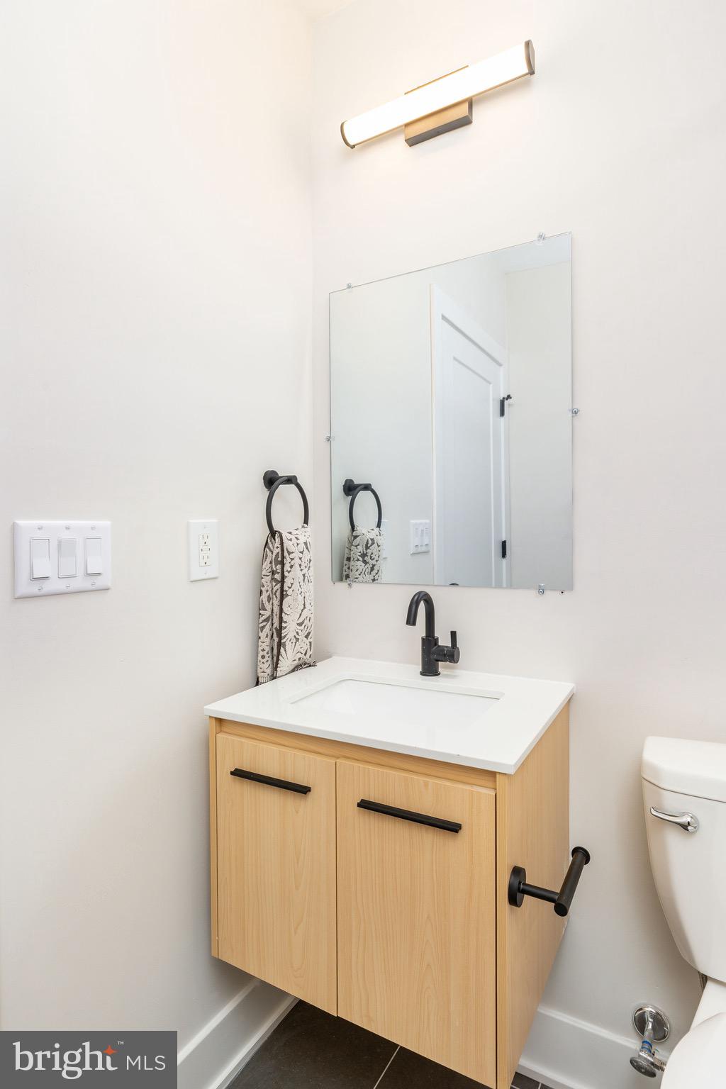 3841 Ridge Avenue Philadelphia, PA 19132 - Photo 42 of 45 a bathroom with a sink toilet vanity and shower