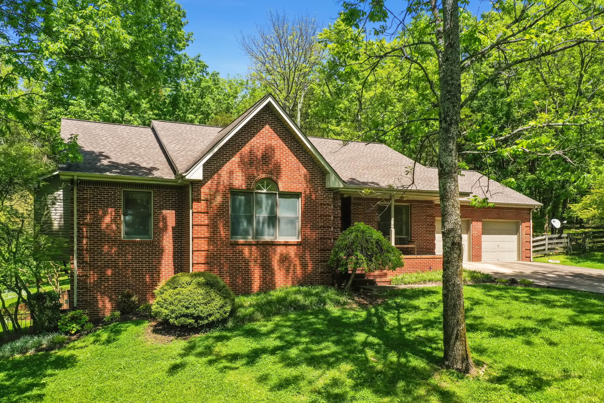 2721 Callis Road Lebanon, TN 37090 - Photo 3 of 38 a front view of a house with garden