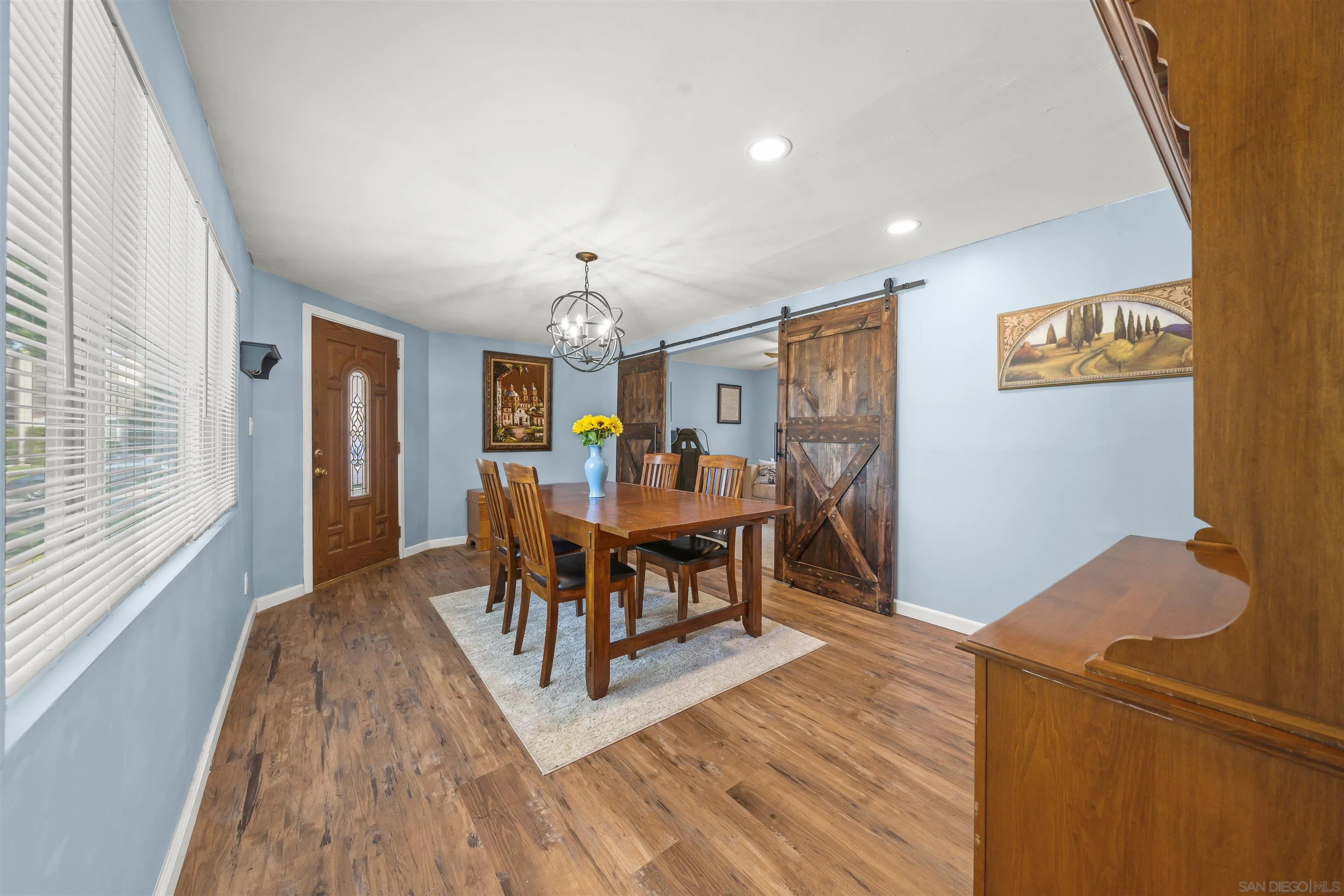 9240 Northcote Road Santee, CA 92071 - Photo 14 of 45 a view of a dining room with furniture window and wooden floor
