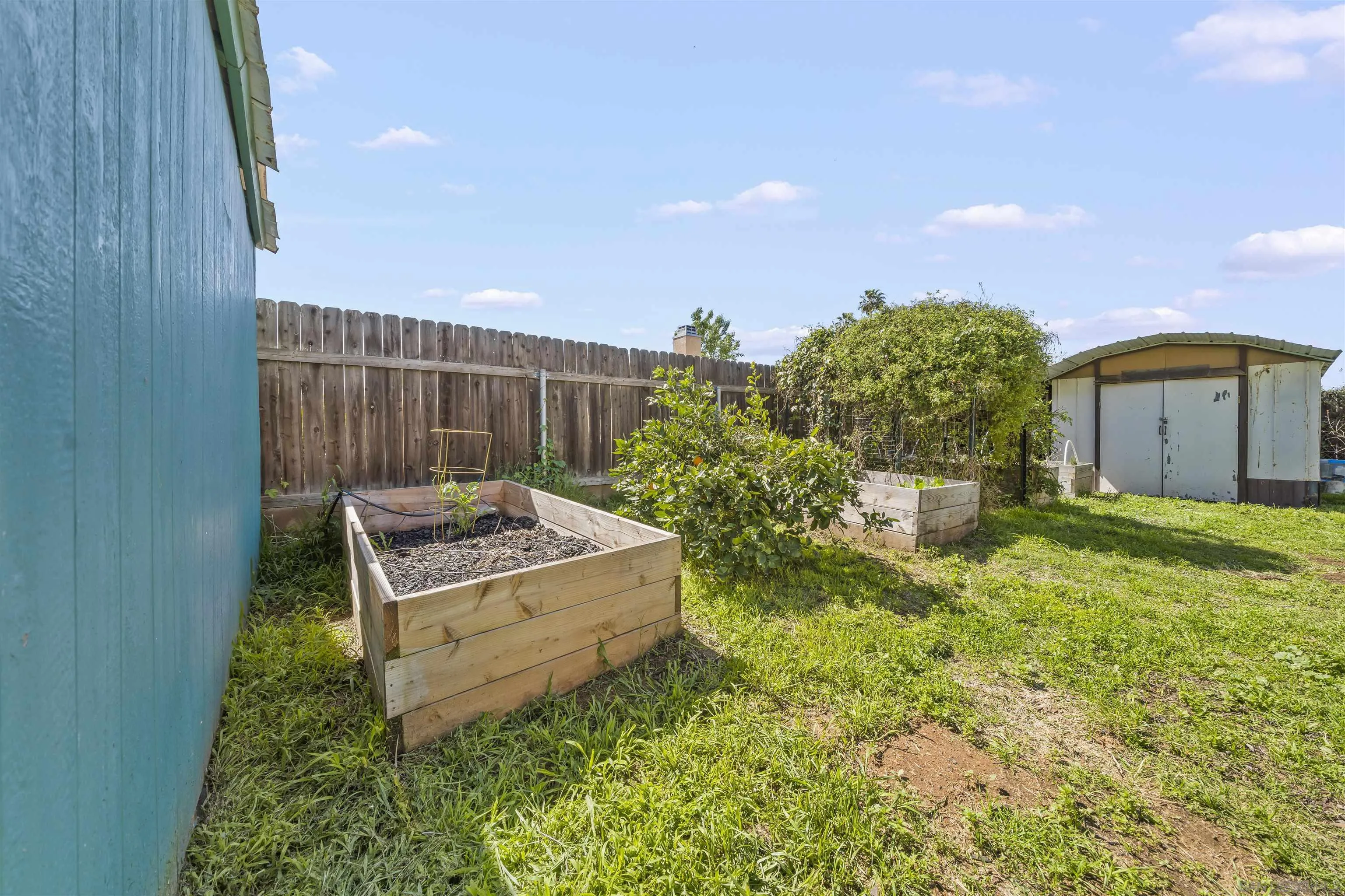 9240 Northcote Road Santee, CA 92071 - Photo 29 of 45 a garden view with a seating space