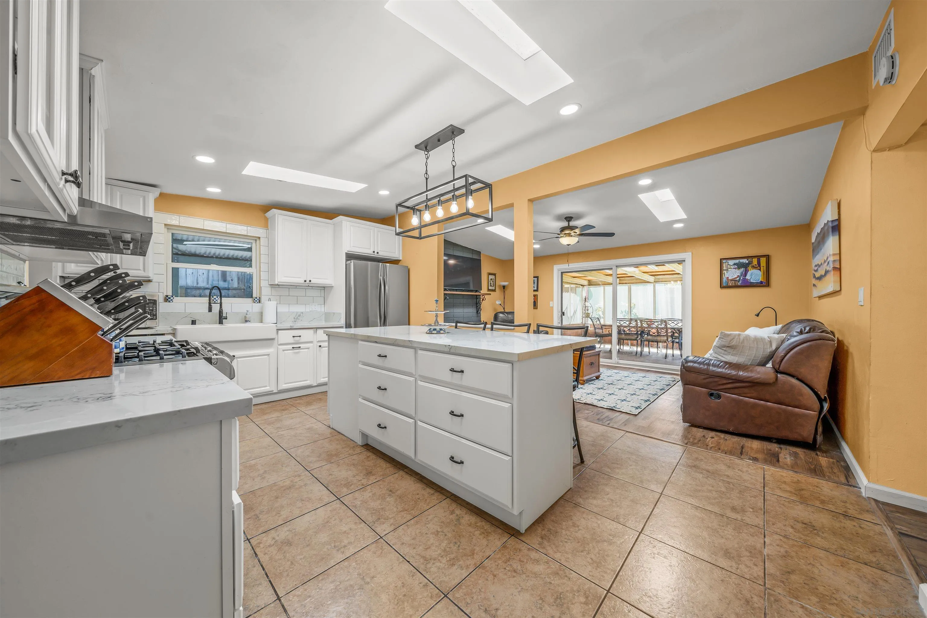 9240 Northcote Road Santee, CA 92071 - Photo 3 of 45 a kitchen with cabinets and window