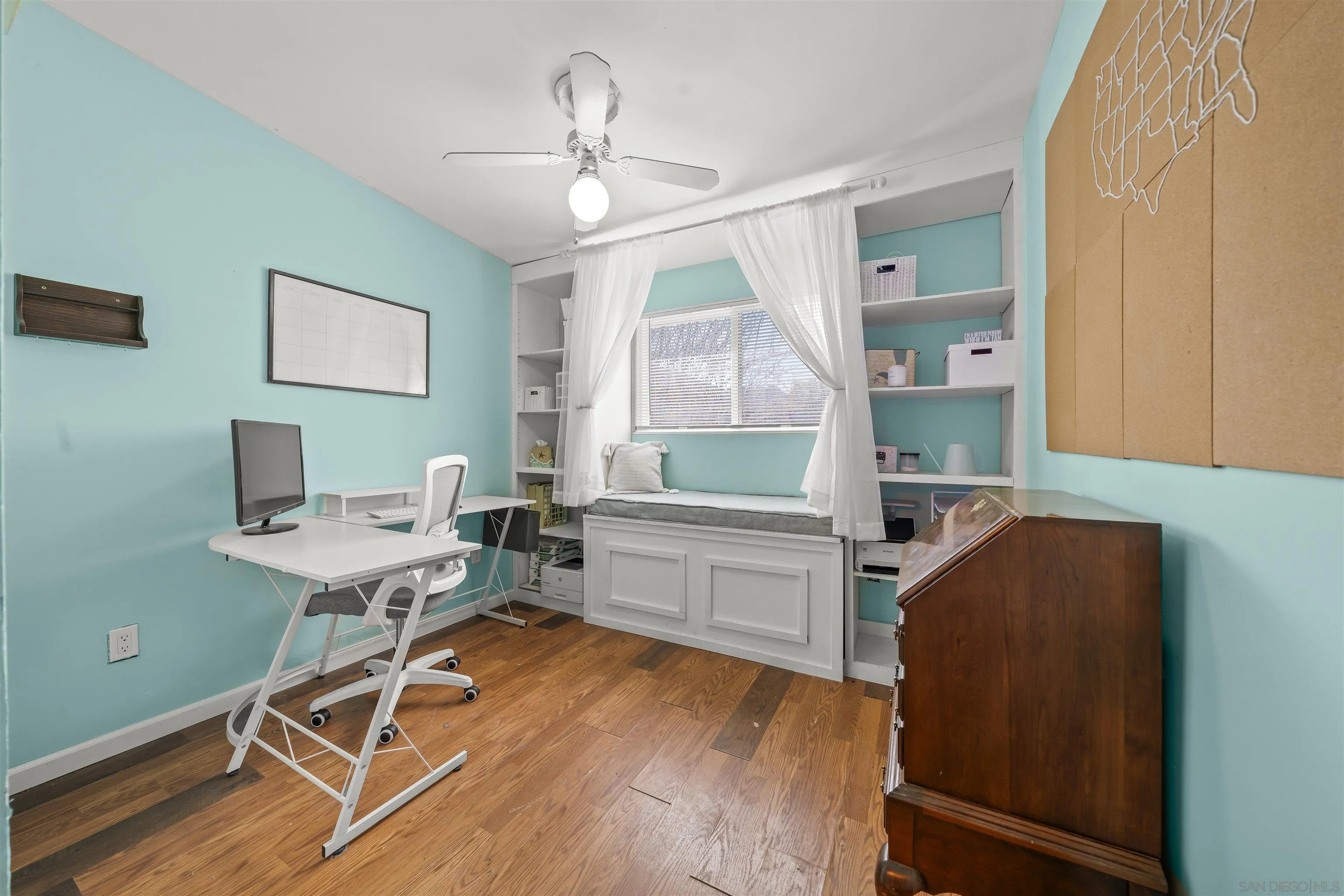 9240 Northcote Road Santee, CA 92071 - Photo 39 of 45 a view of a workspace with furniture and a kitchen