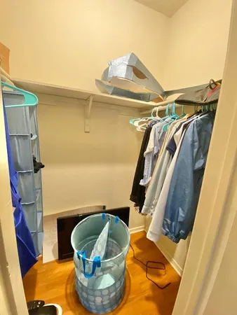 a bathroom with a sink mirror and a bathtub