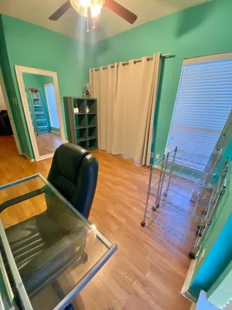 a view of a room with table and chair