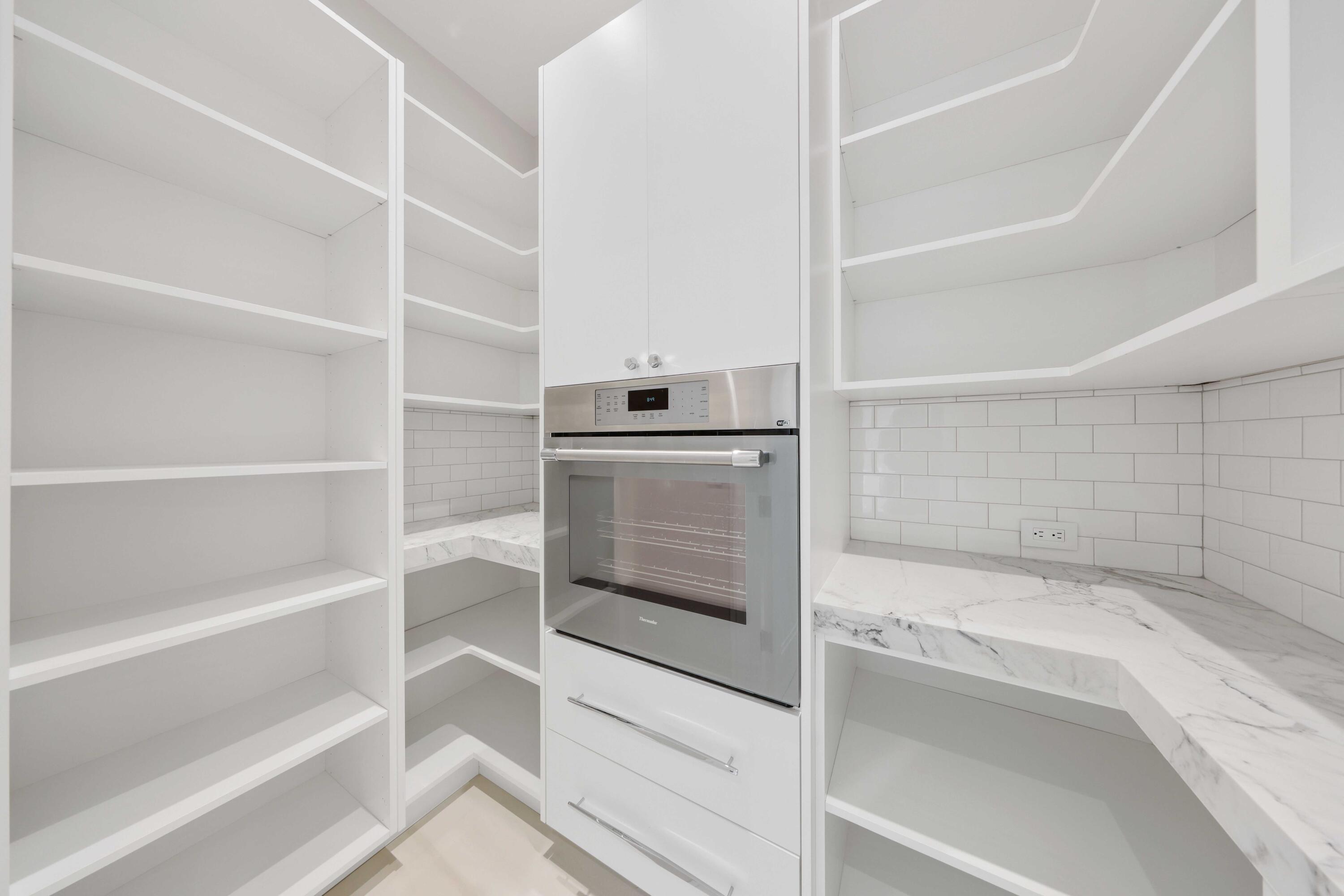 151 Eden Ridge Lane Boynton Beach, FL 33435 - Photo 23 of 74 a bathroom with a bathtub and a shower