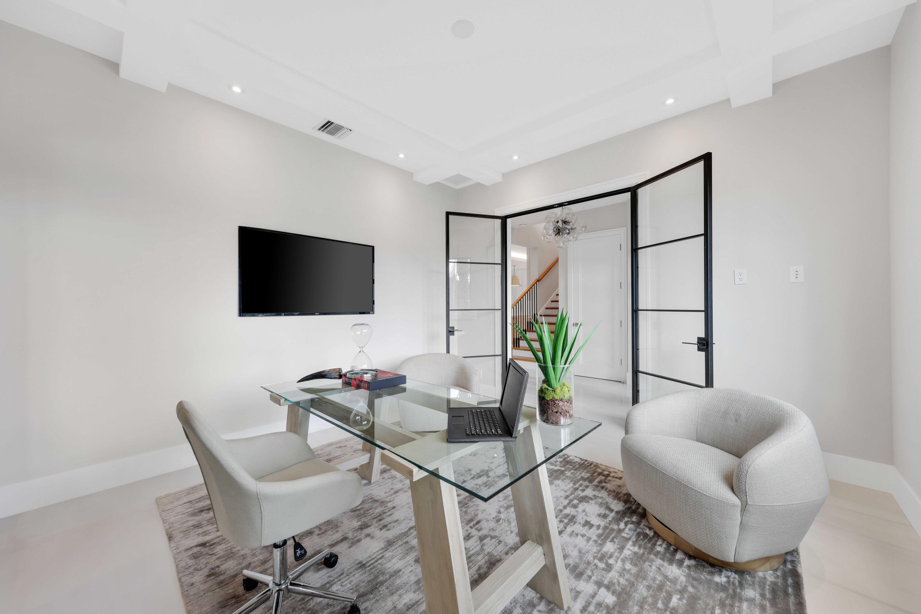 151 Eden Ridge Lane Boynton Beach, FL 33435 - Photo 30 of 74 a living room with furniture and a flat screen tv