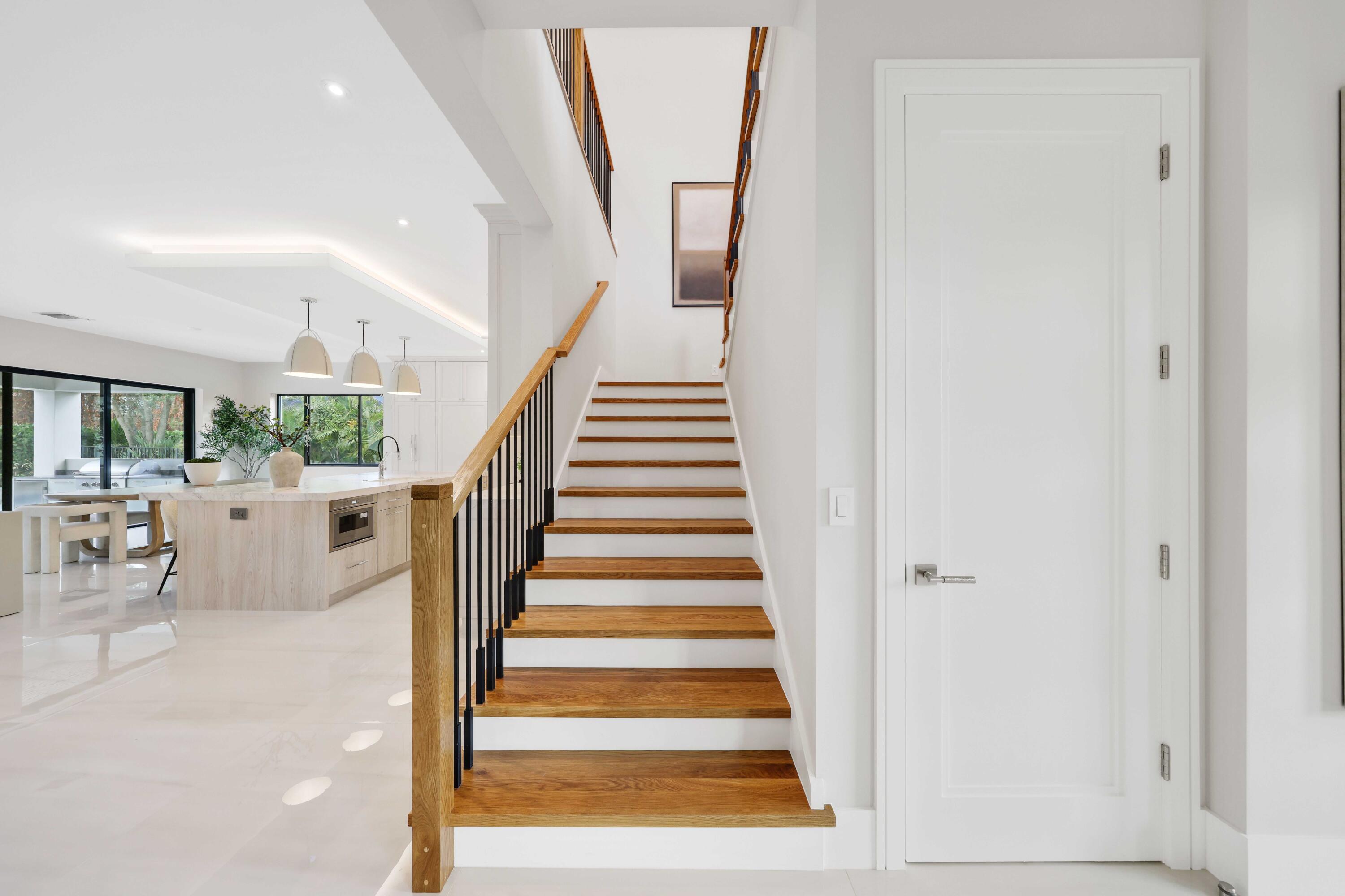 151 Eden Ridge Lane Boynton Beach, FL 33435 - Photo 31 of 74 a view of entryway and hall with wooden floor