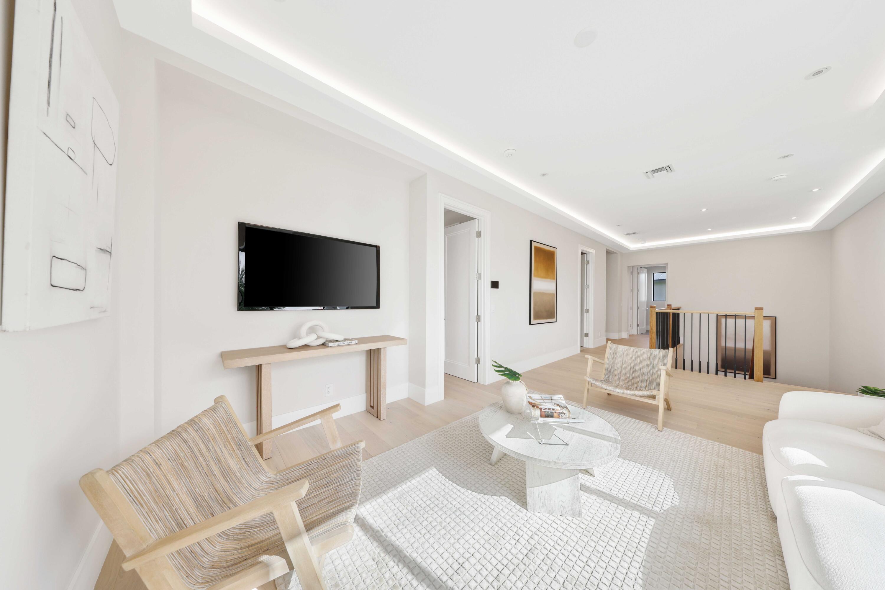 151 Eden Ridge Lane Boynton Beach, FL 33435 - Photo 37 of 74 a living room with furniture and a flat screen tv