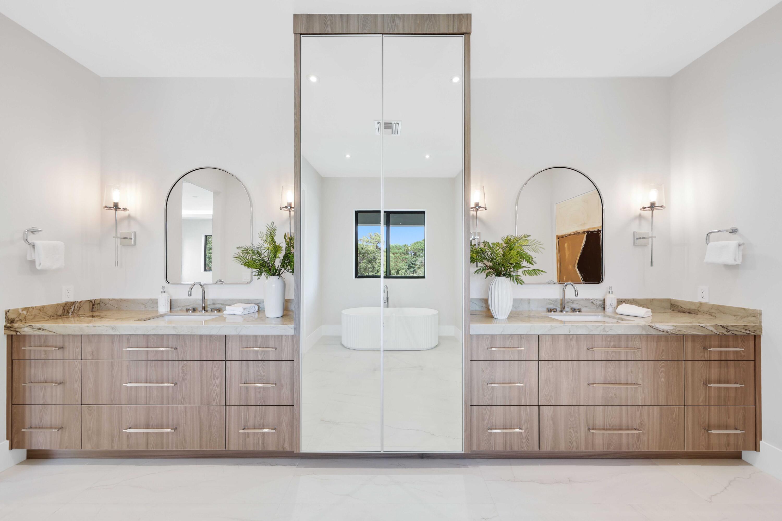 151 Eden Ridge Lane Boynton Beach, FL 33435 - Photo 55 of 74 a spacious bathroom with a granite countertop sink a mirror and a