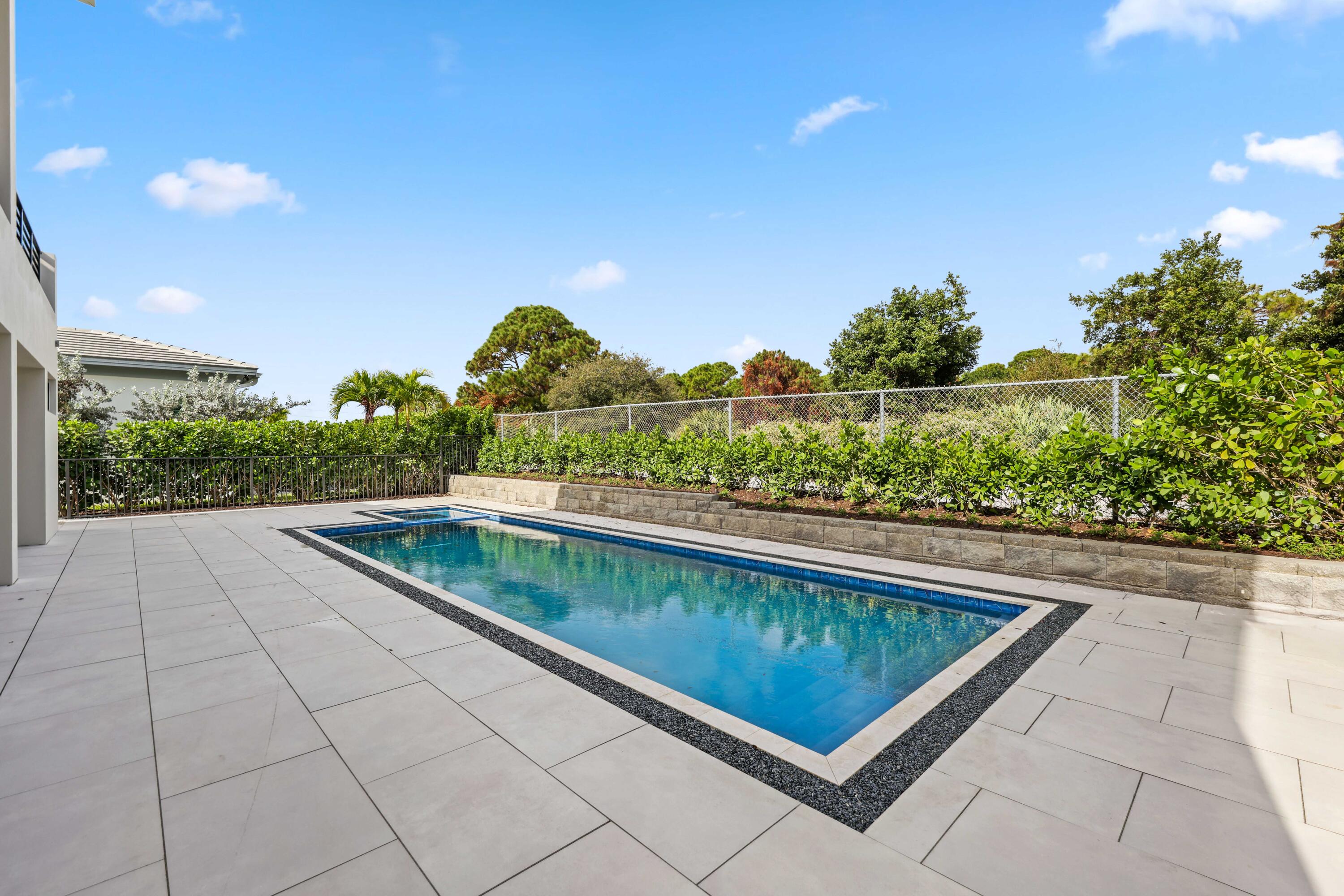 151 Eden Ridge Lane Boynton Beach, FL 33435 - Photo 65 of 74 a view of swimming pool from a balcony