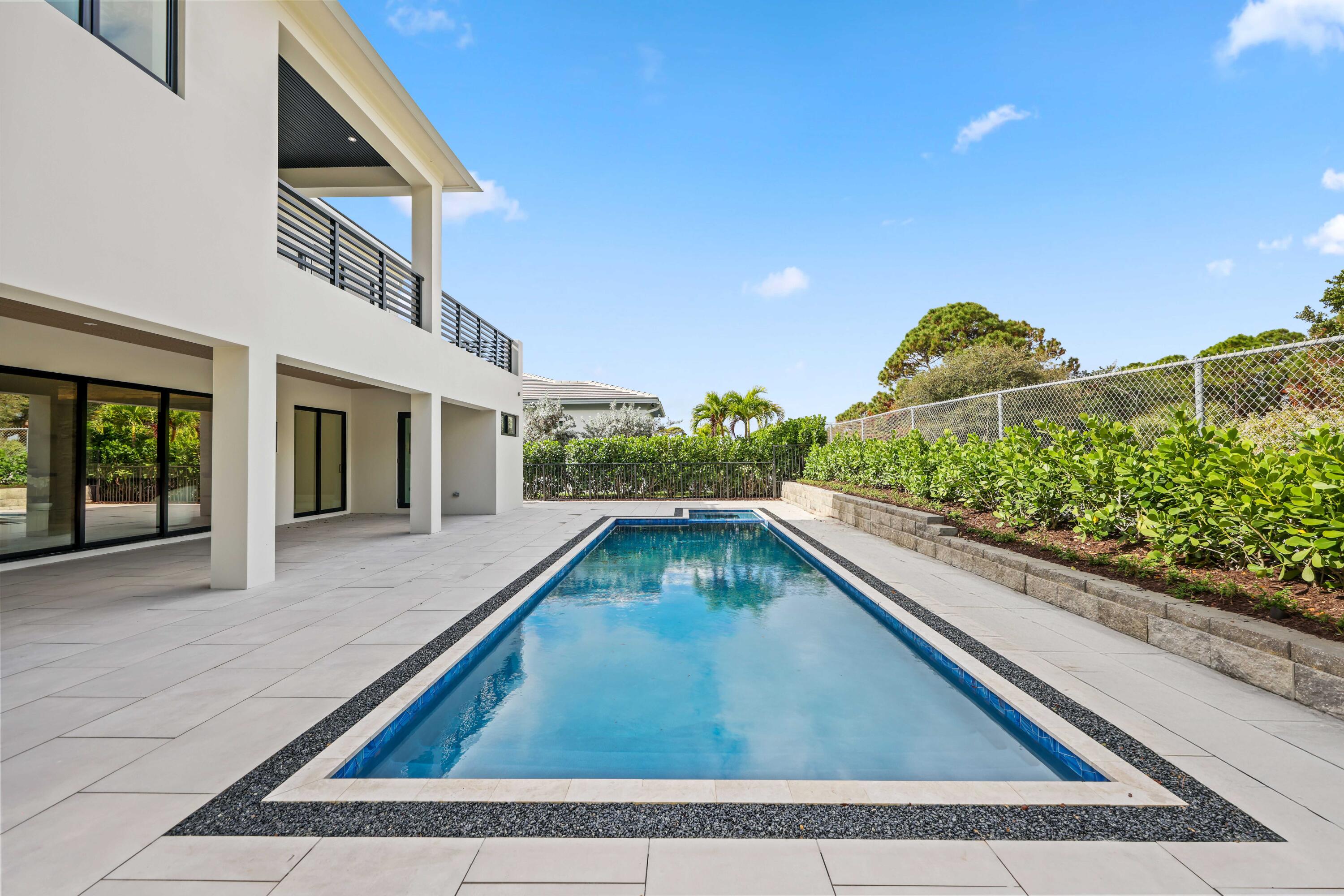 151 Eden Ridge Lane Boynton Beach, FL 33435 - Photo 66 of 74 a view of swimming pool with a outdoor seating