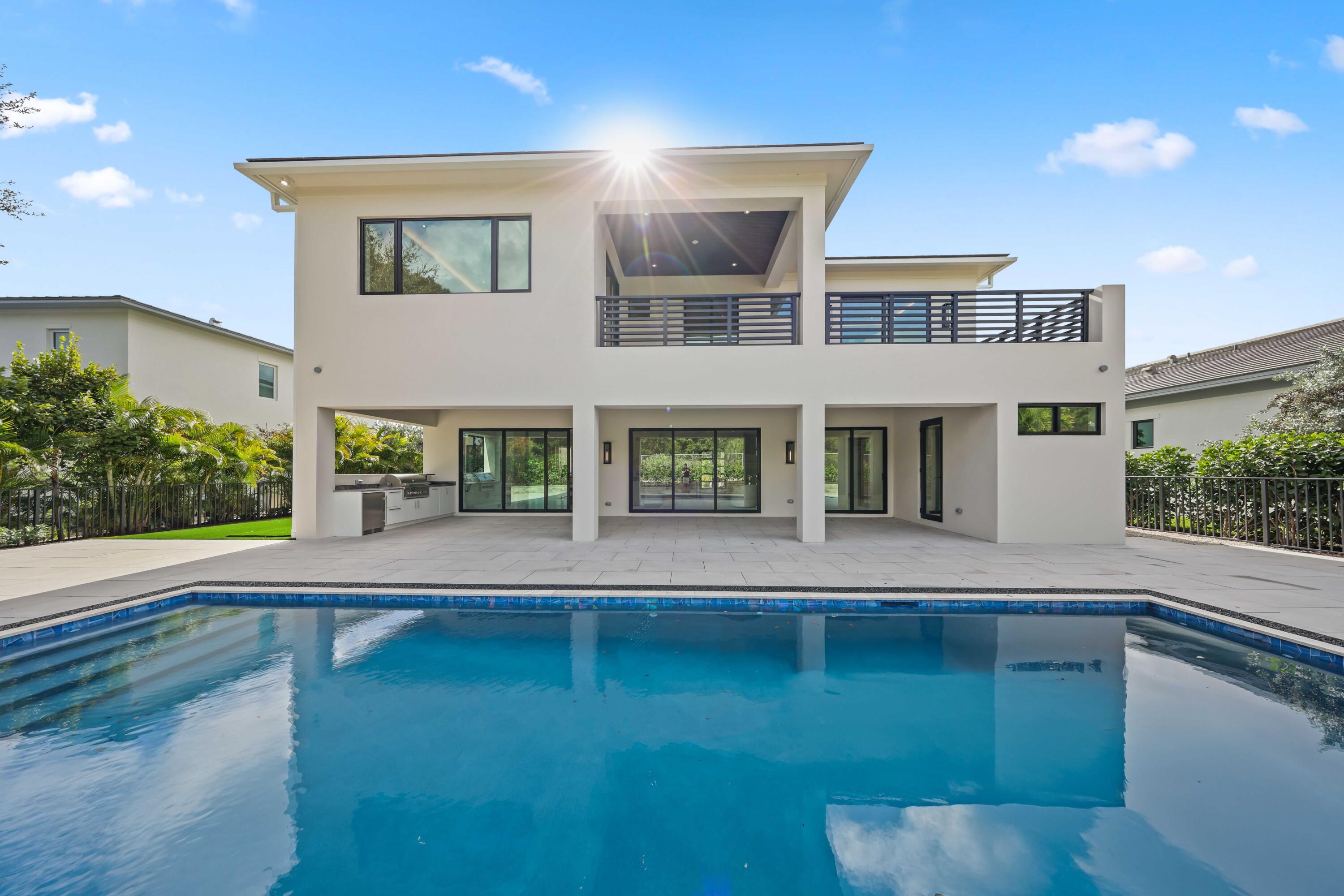 151 Eden Ridge Lane Boynton Beach, FL 33435 - Photo 70 of 74 a view of an house with swimming pool