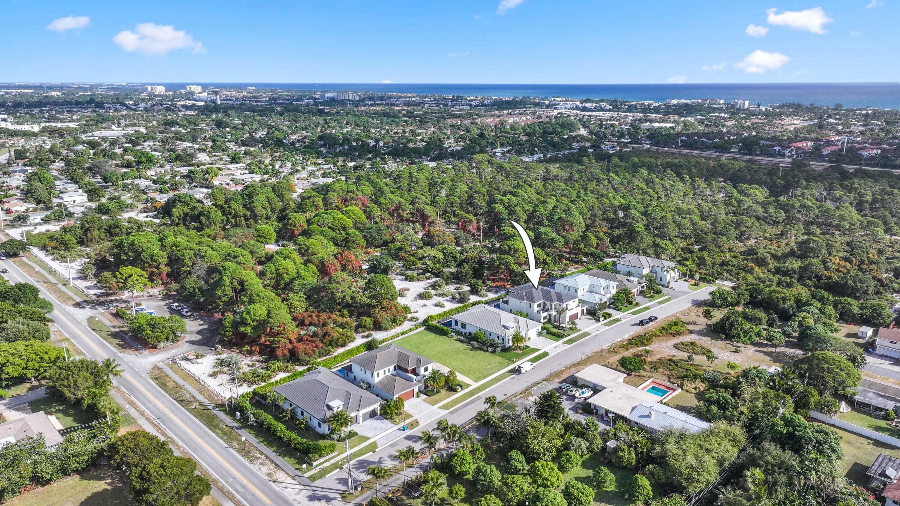 151 Eden Ridge Lane Boynton Beach, FL 33435 - Photo 74 of 74 an aerial view of house with yard swimming pool and outdoor seating