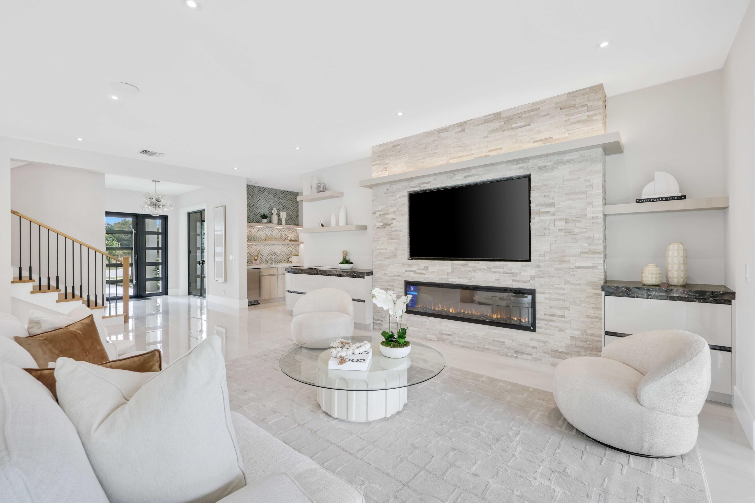 151 Eden Ridge Lane Boynton Beach, FL 33435 - Photo 9 of 74 a living room with furniture and a flat screen tv