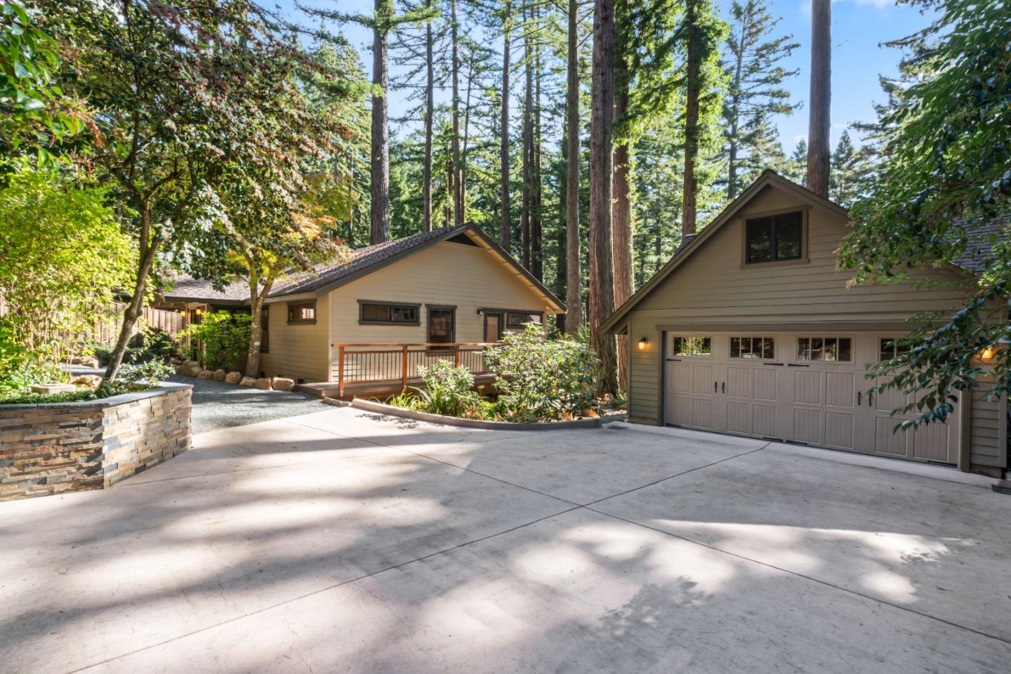 126 Filbert Road Woodside, CA 94062 - Photo 1 of 61 a front view of a house with a garden