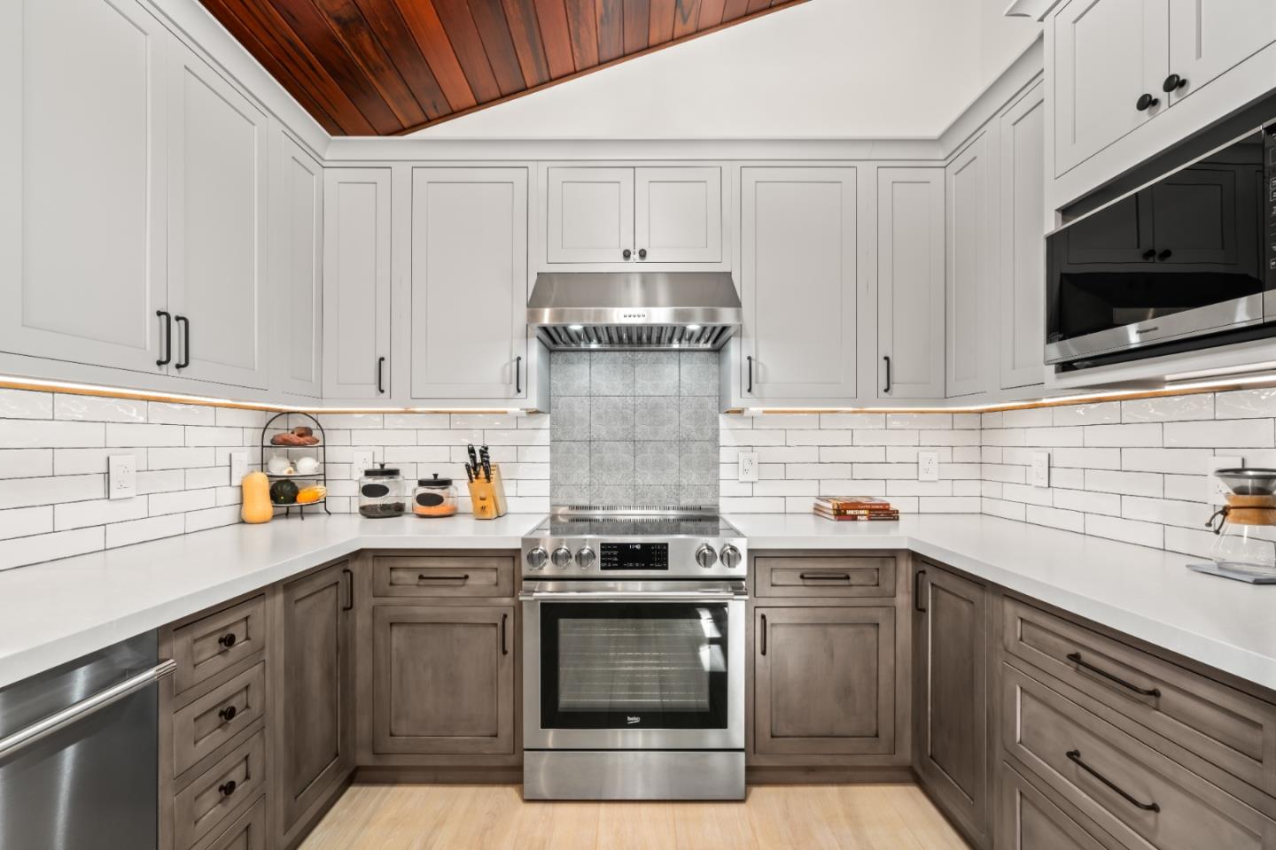 126 Filbert Road Woodside, CA 94062 - Photo 23 of 61 a kitchen with stainless steel appliances granite countertop a stove and a sink