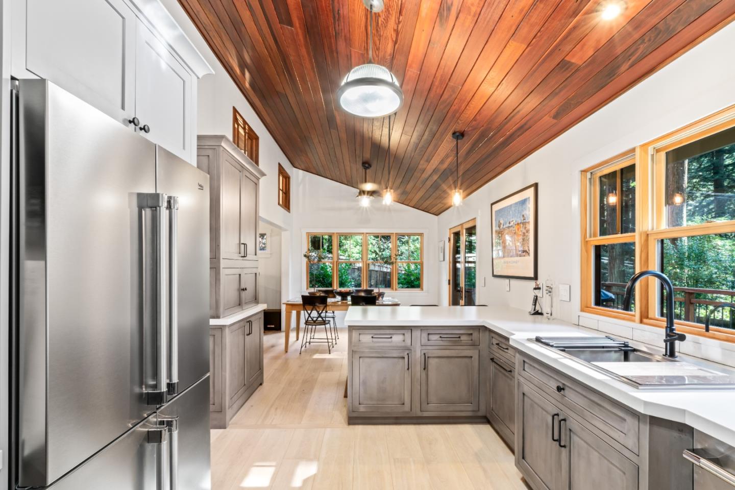 126 Filbert Road Woodside, CA 94062 - Photo 25 of 61 a large kitchen with a large window and stainless steel appliances