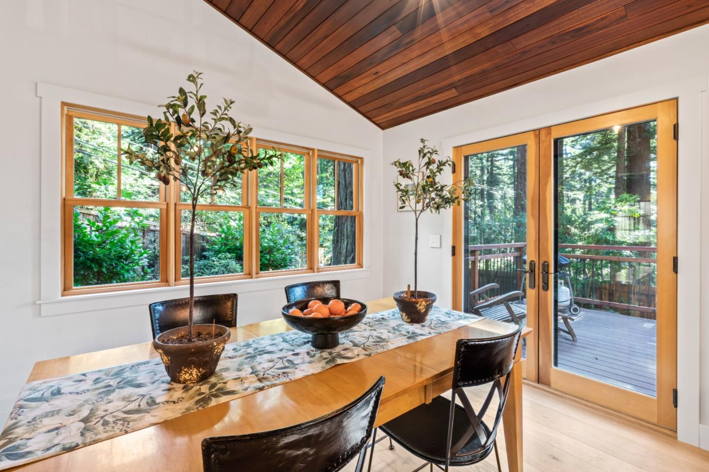126 Filbert Road Woodside, CA 94062 - Photo 26 of 61 a dining room with furniture a chandelier and glass door