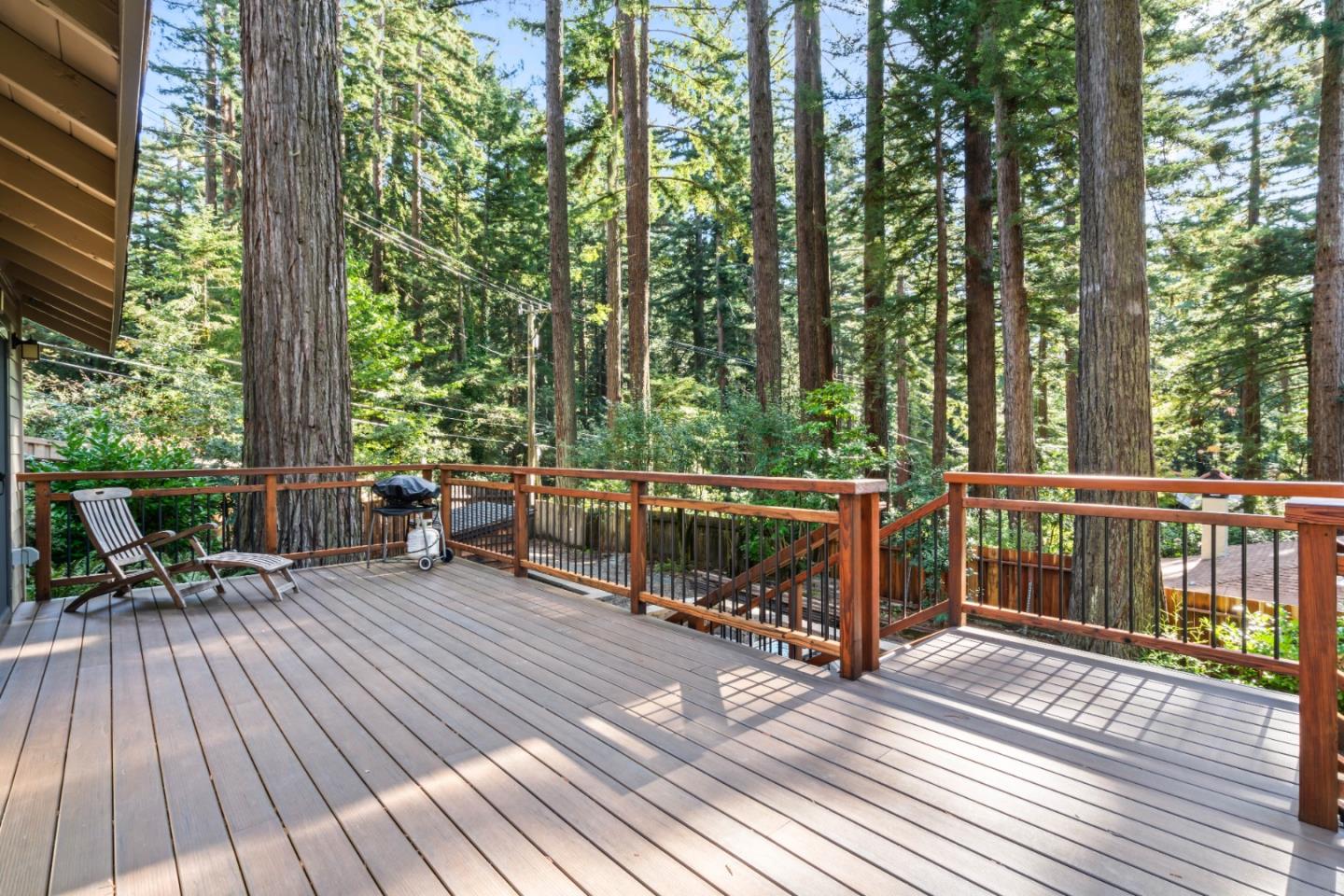 126 Filbert Road Woodside, CA 94062 - Photo 28 of 61 a view of a deck with chairs and wooden floor