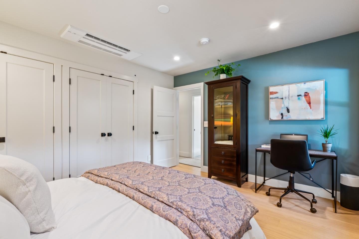 126 Filbert Road Woodside, CA 94062 - Photo 33 of 61 a bedroom with a bed and a workspace
