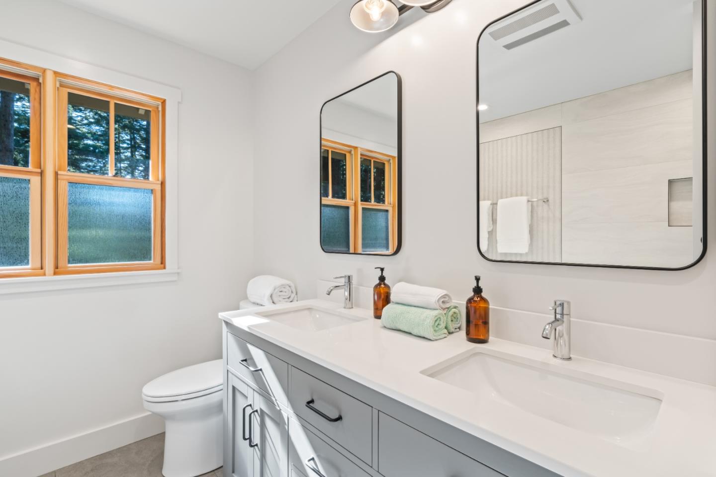 126 Filbert Road Woodside, CA 94062 - Photo 36 of 61 a bathroom with a sink vanity mirror and toilet