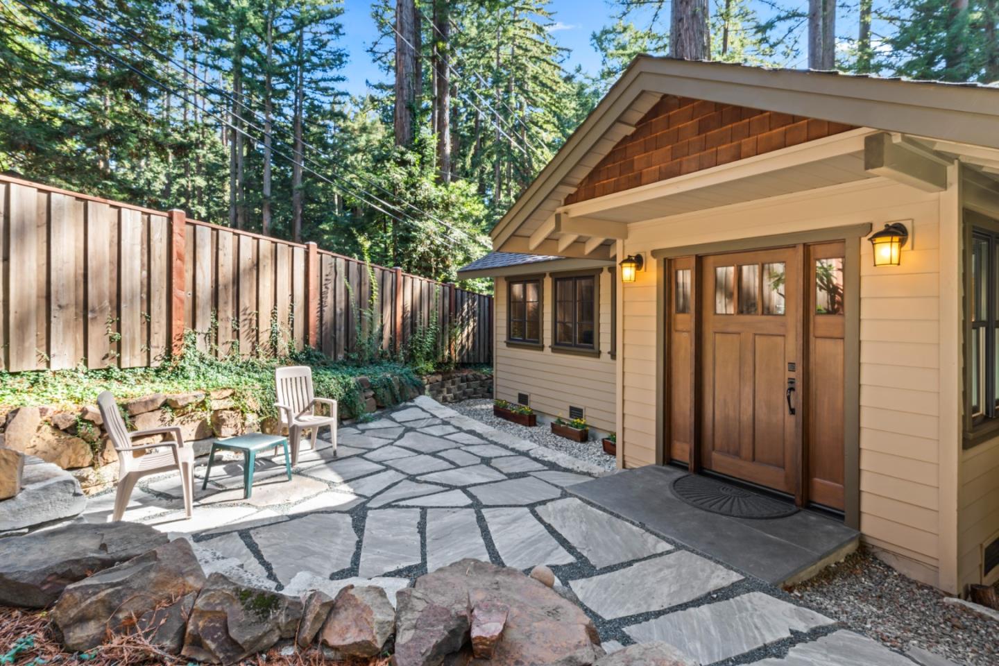 126 Filbert Road Woodside, CA 94062 - Photo 4 of 61 a backyard of a house with chairs and table