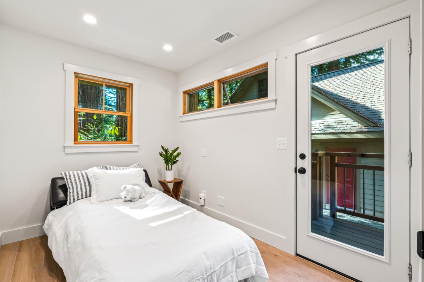 126 Filbert Road Woodside, CA 94062 - Photo 41 of 61 a bedroom with a bed and a large window