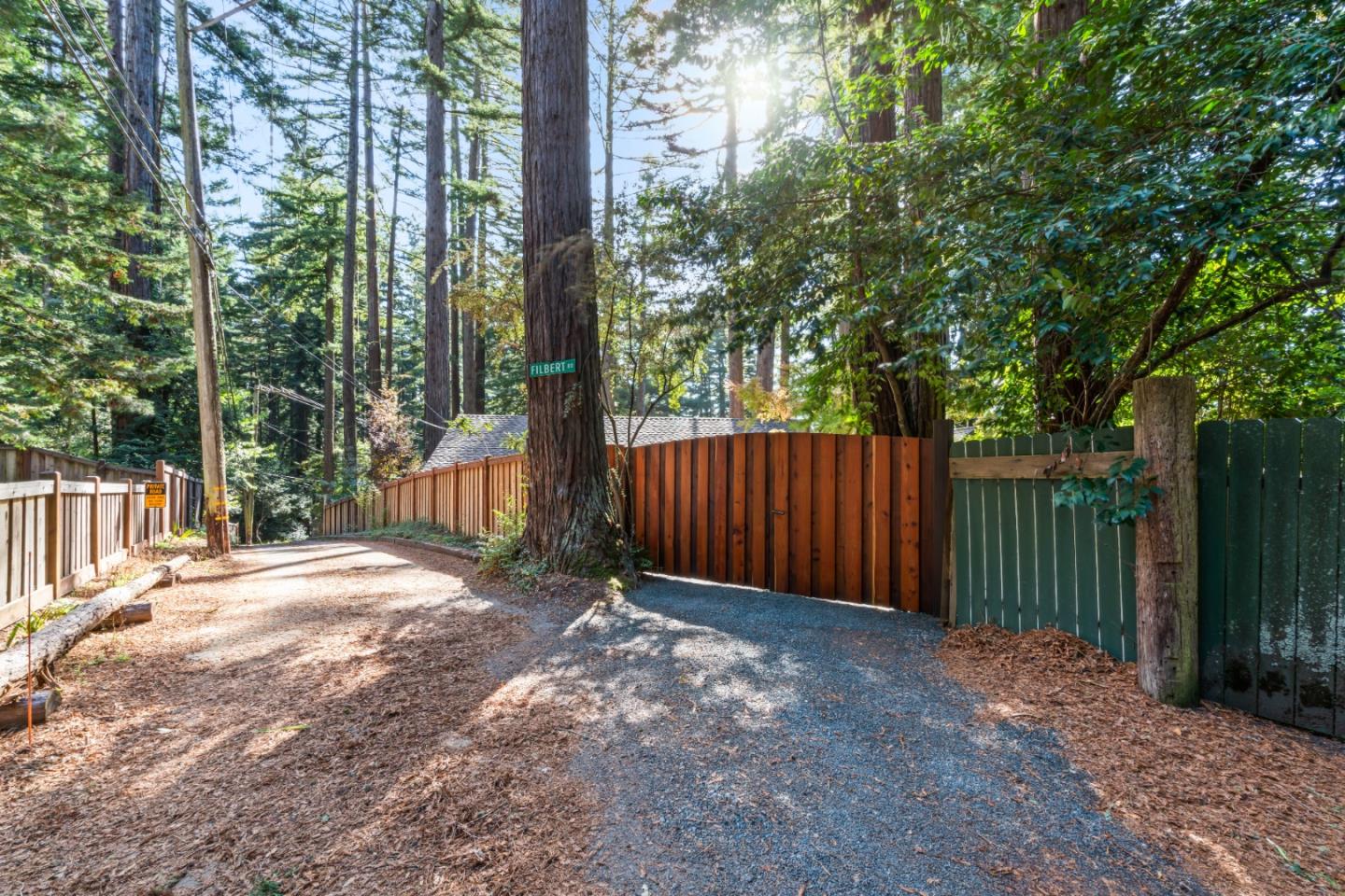 126 Filbert Road Woodside, CA 94062 - Photo 53 of 61 a view of backyard with wooden fence and trees