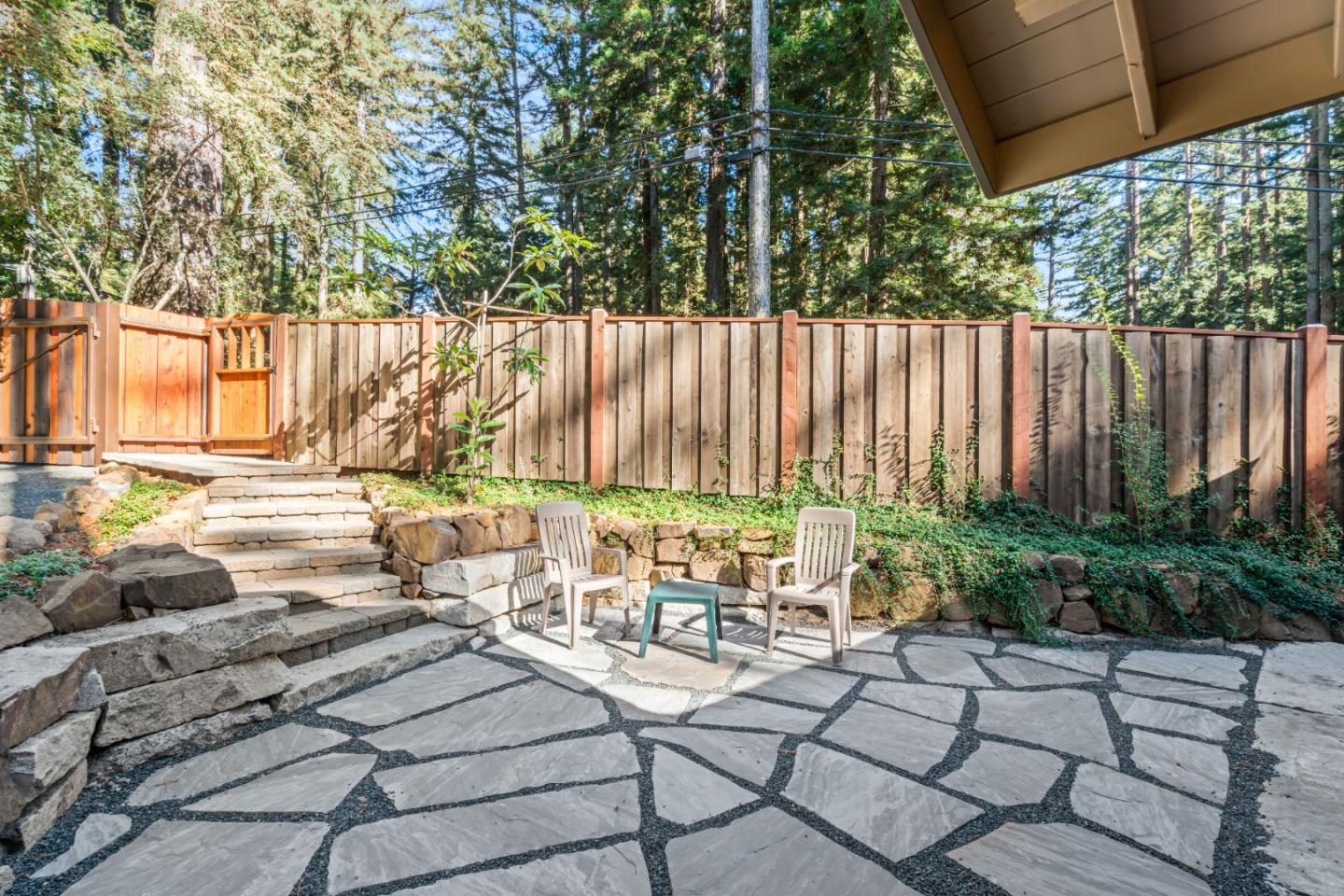 126 Filbert Road Woodside, CA 94062 - Photo 6 of 61 a view of a chairs and tables in the patio