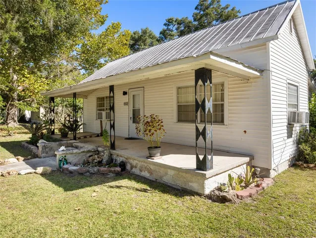 a front view of a house with entertaining space