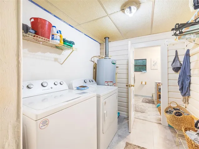a bathroom with a sink and a curtain