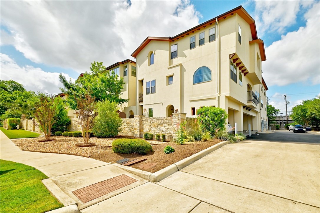 a view of a building with a street