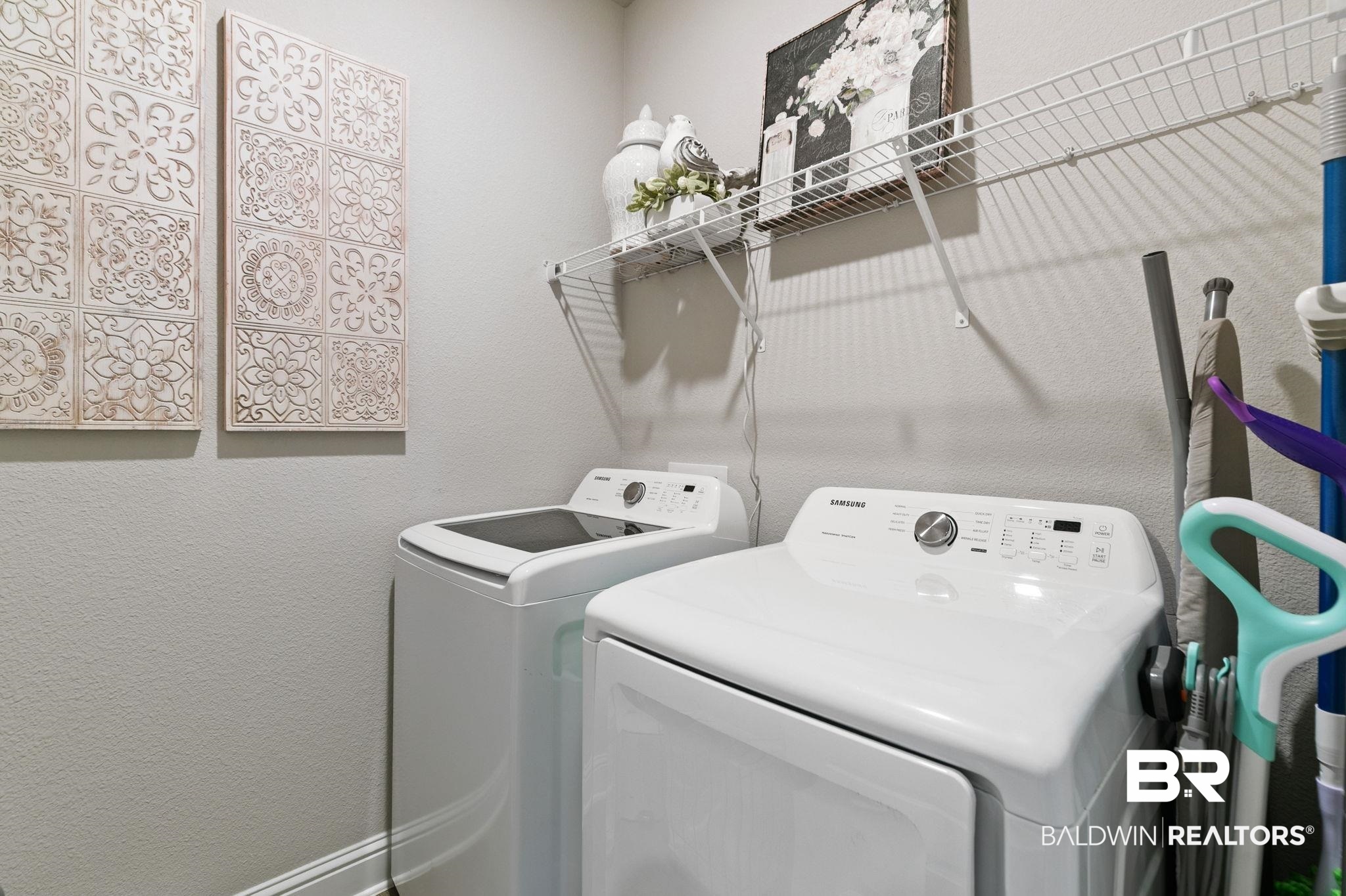 31650 Memphis Loop Daphne, AL 36527 - Photo 39 of 68 Laundry room with a textured wall and separate washer and dryer