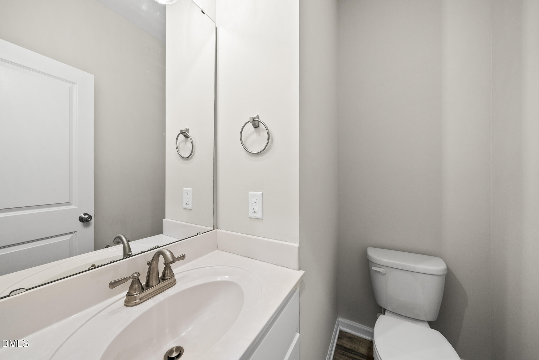 1177 Mudham Road Wendell, NC 27591 - Photo 12 of 30 a bathroom with a sink toilet and a mirror