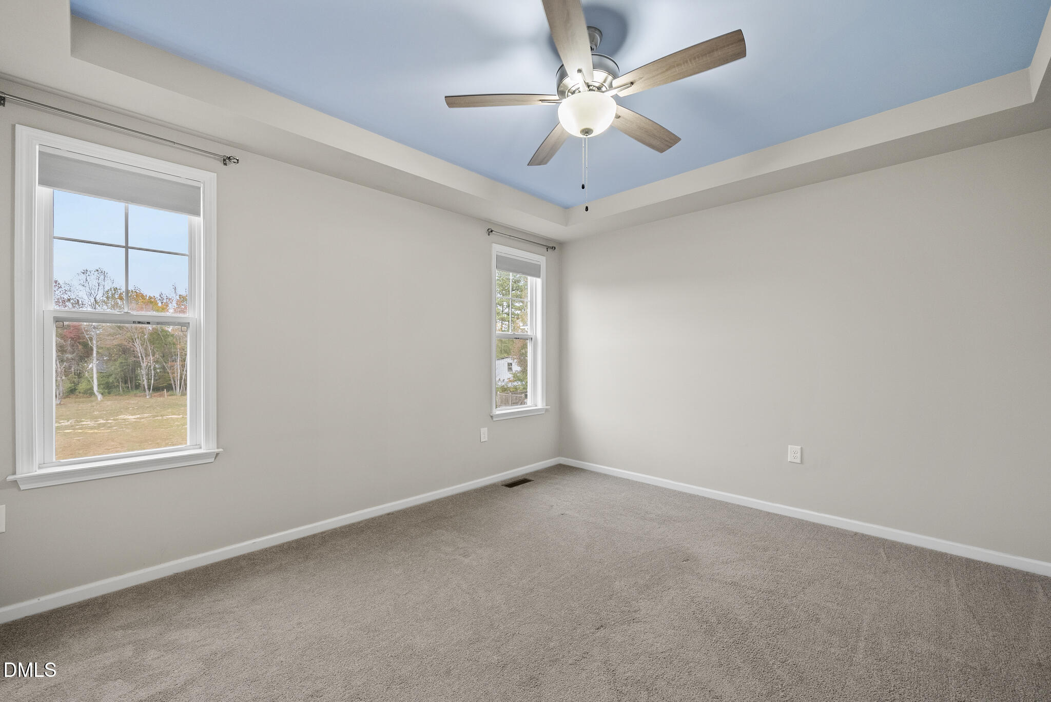 1177 Mudham Road Wendell, NC 27591 - Photo 13 of 30 an empty room with a window and a fan