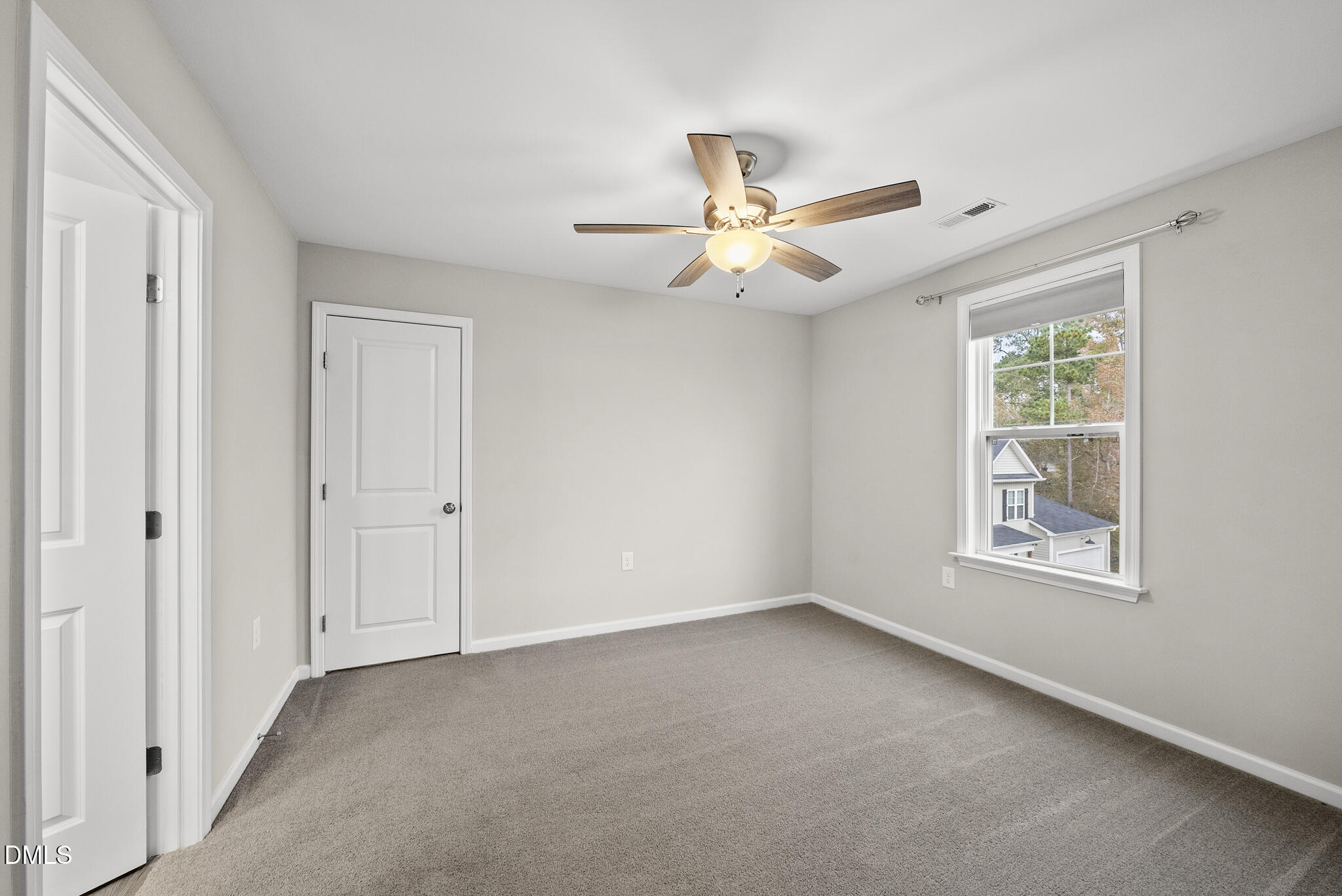 1177 Mudham Road Wendell, NC 27591 - Photo 18 of 30 a view of an empty room with a window