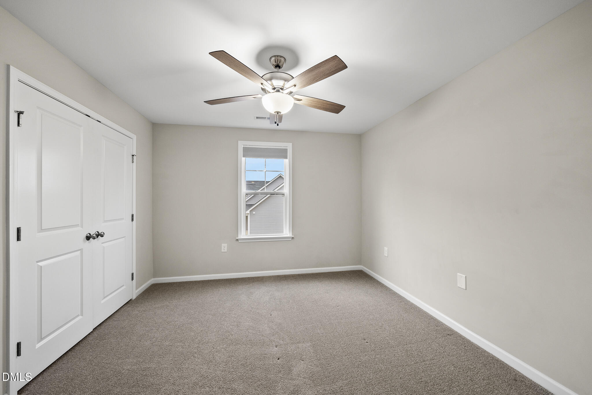 1177 Mudham Road Wendell, NC 27591 - Photo 24 of 30 an empty room with windows and fan